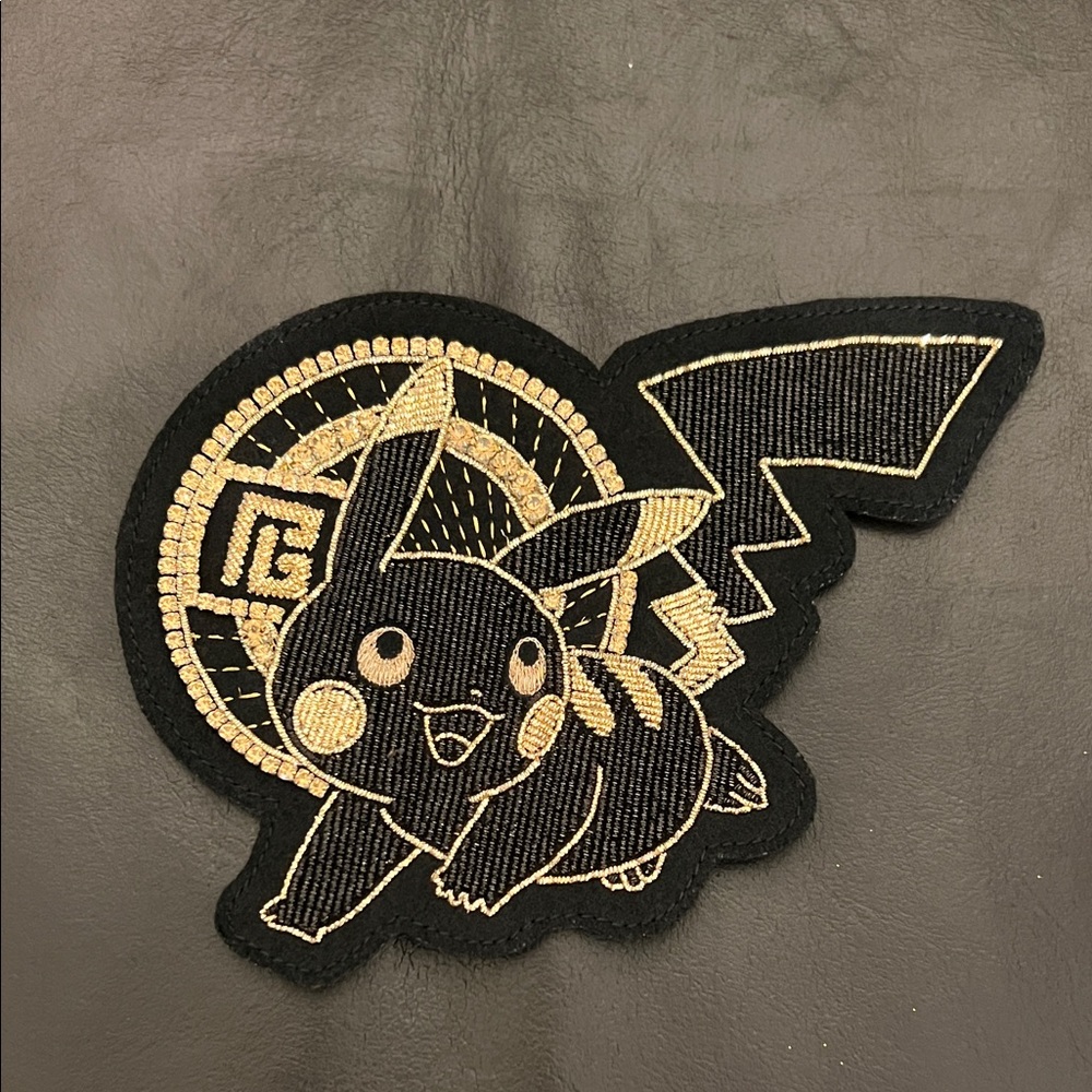 Balmain x Pokémon unisex Black & Gold logo monogram patch NEW RARE!